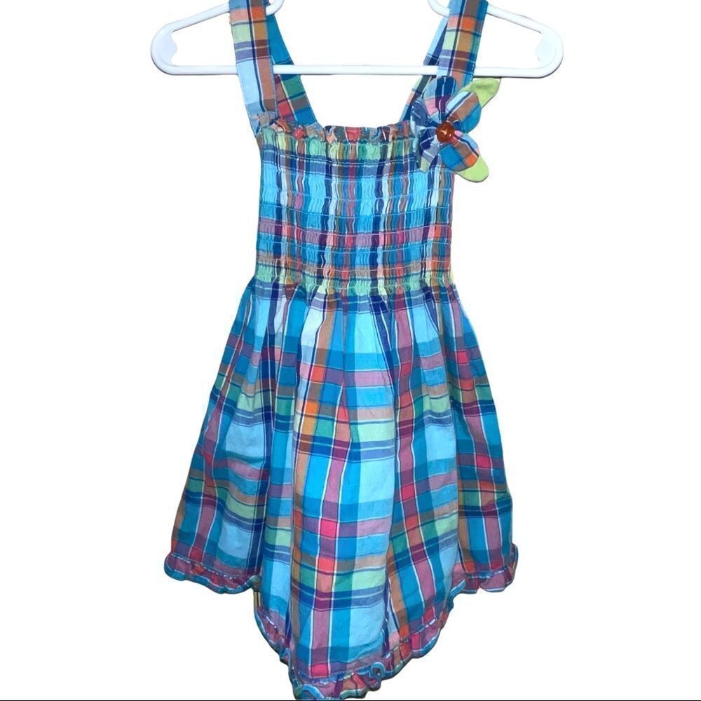 Pete’s Partner Plaid Smocked Sundress with Flower Accent